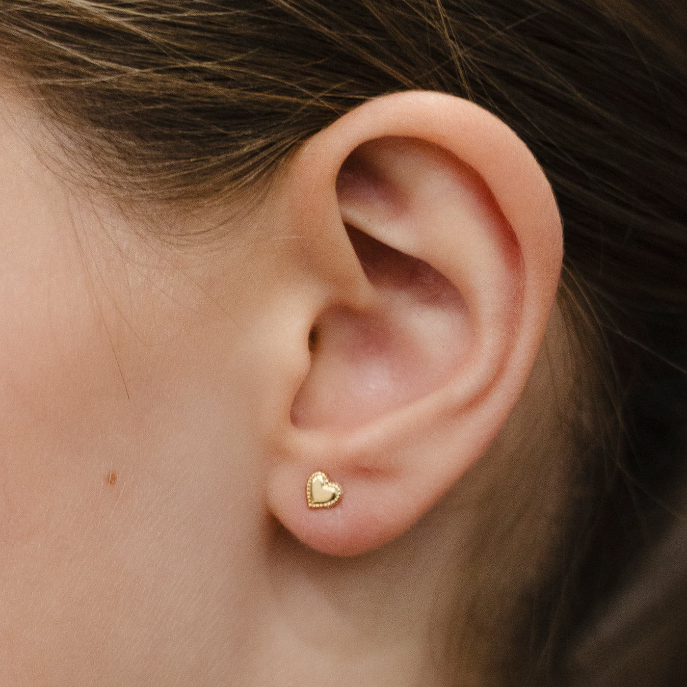 Mini gold heart stud earring